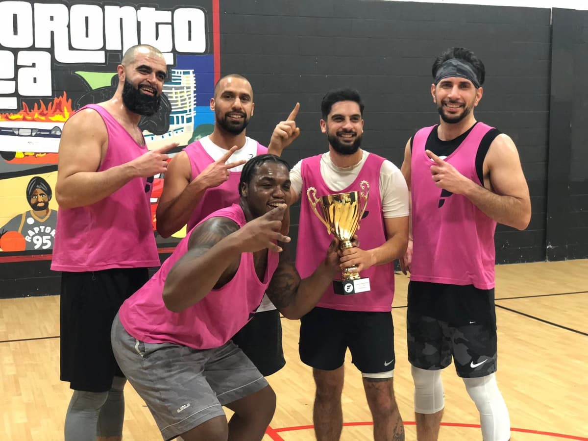 Fitsports basketball team with trophy
